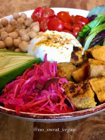 Vegan bowl with spicy pickled cabbage.