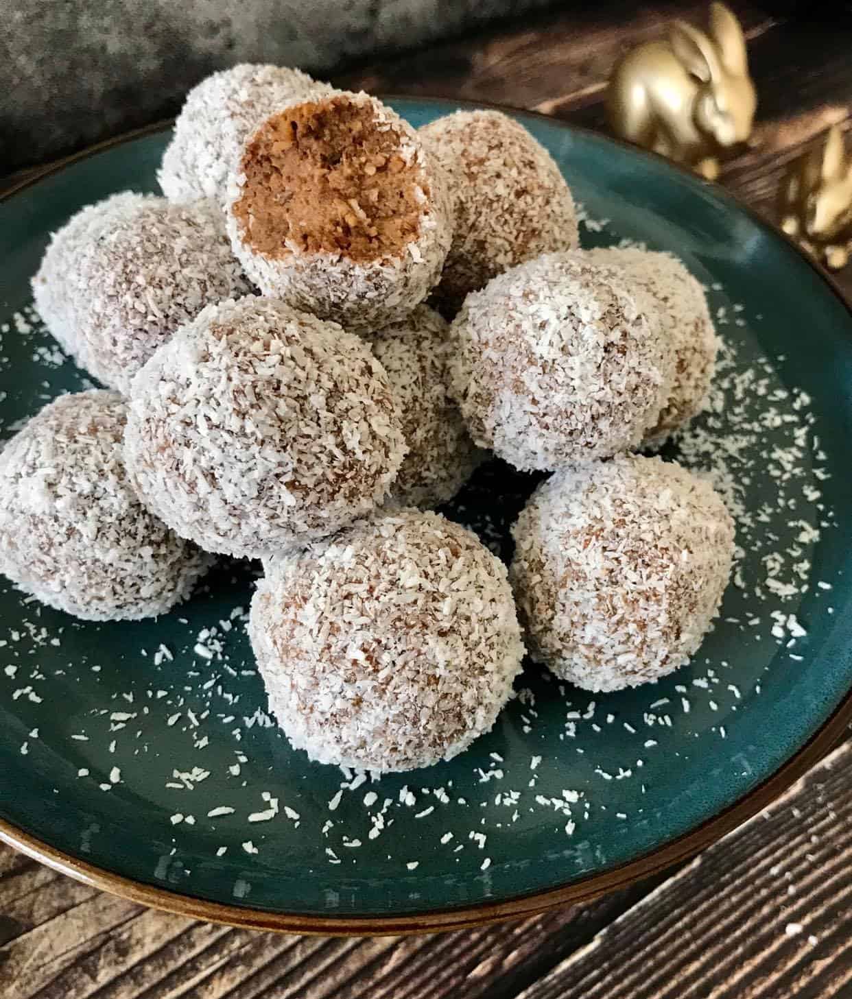 Vegan no-bake carrot cake bites on a plate.