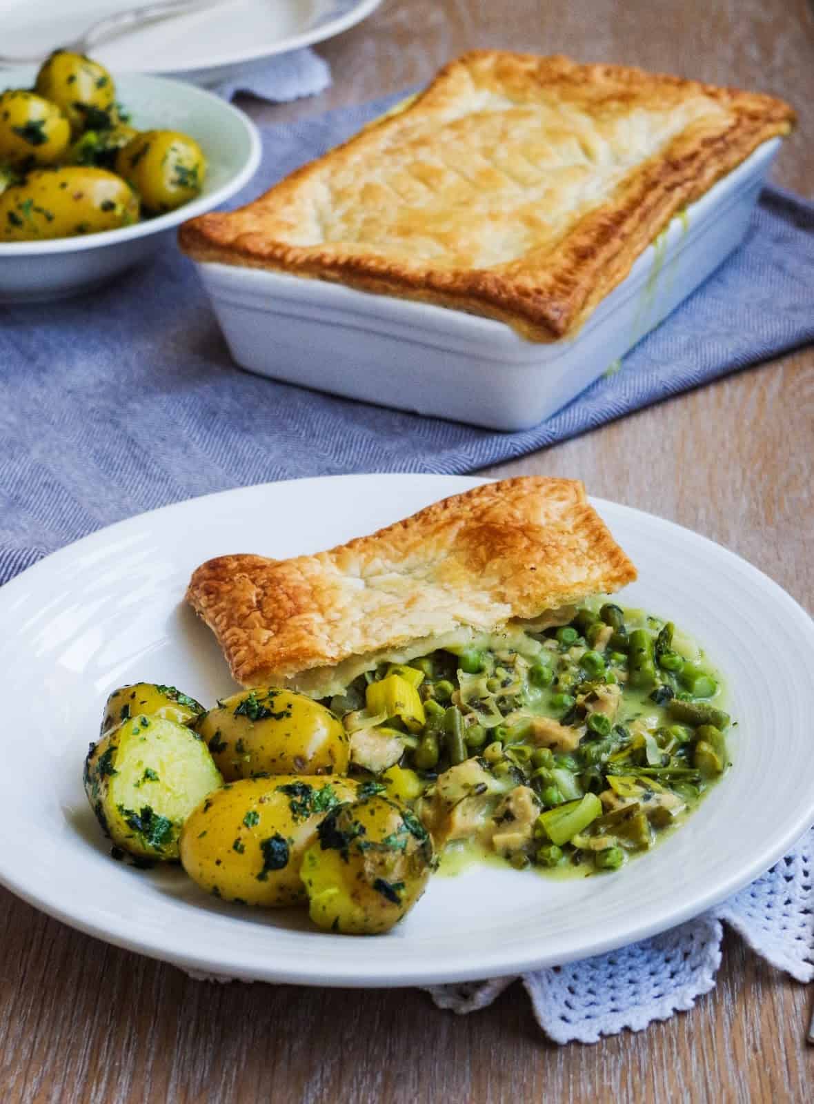 Vegan spring veggie pot pie on a plate.