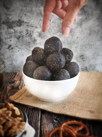 Bowl of vegan no-bake pretzel brownie bites.