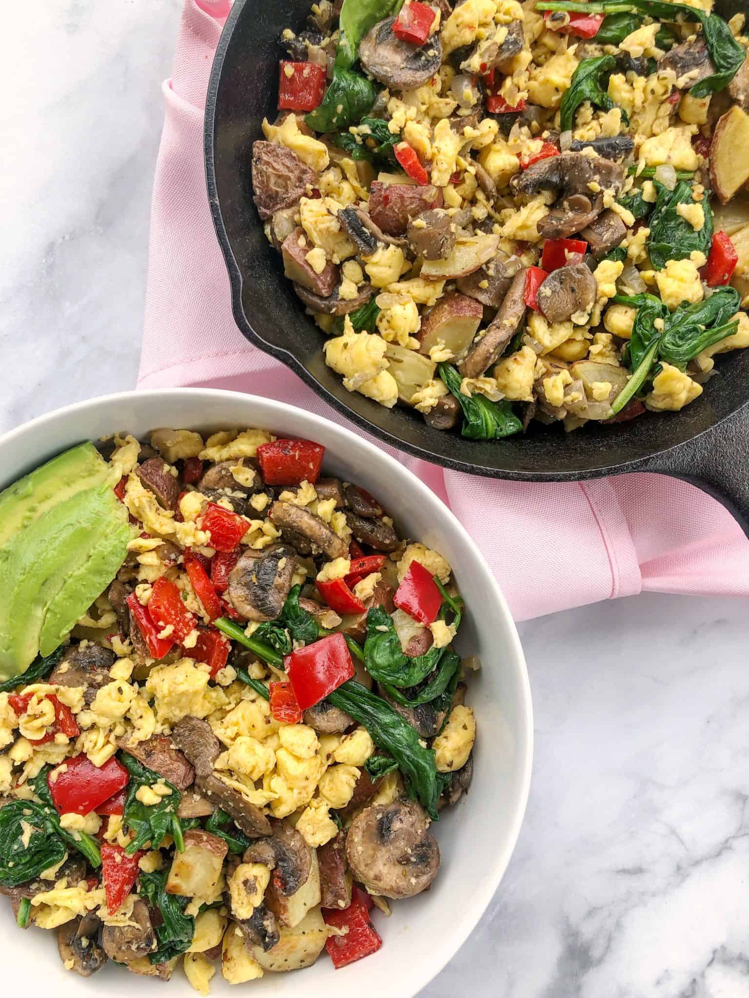 Vegan breakfast hash in a bowl and in a skillet.
