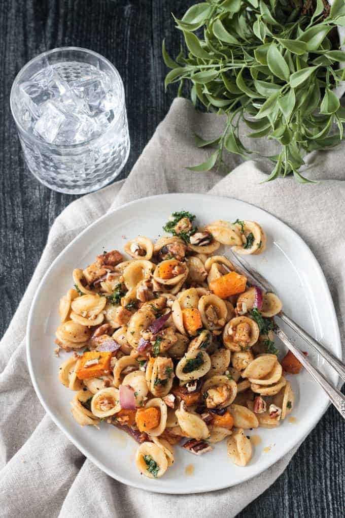 Fall roasted vegetable pasta on a plate.