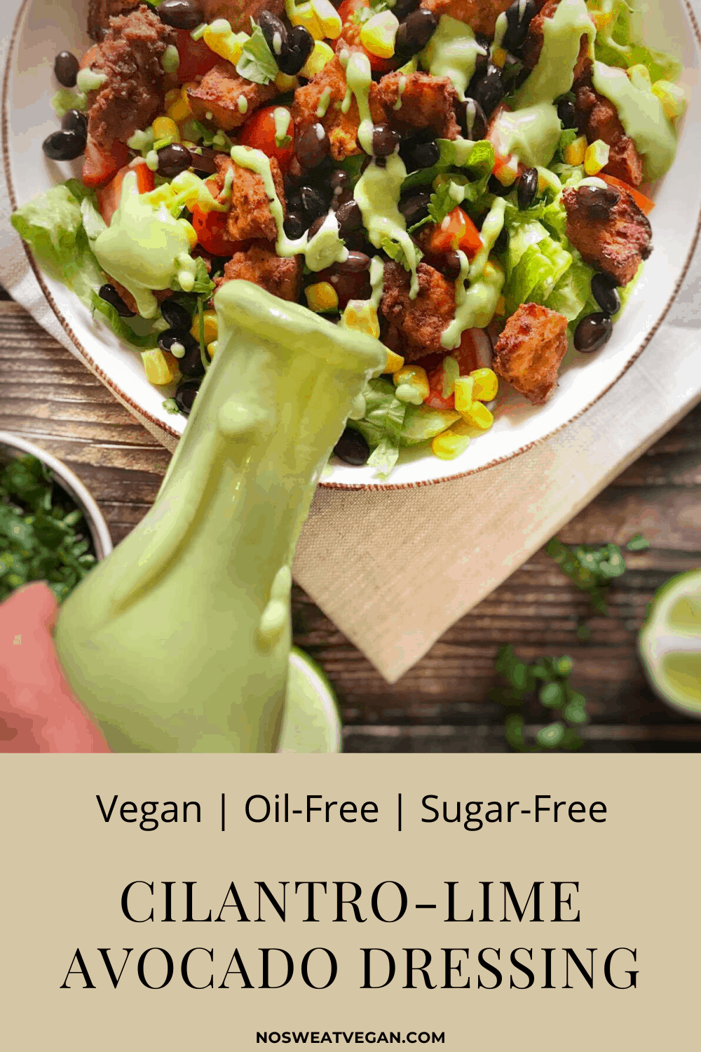 Cilantro-lime dressing poured over a salad bowl.