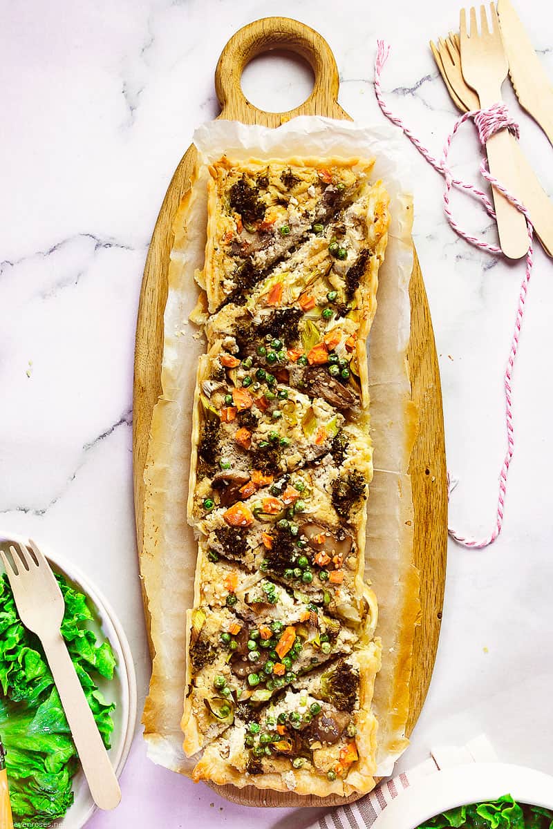 Spring vegetable tart on a cutting board.