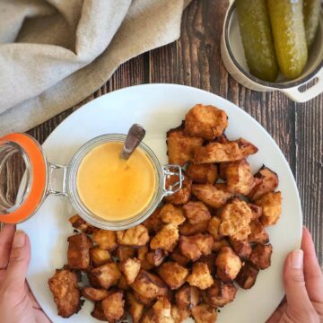 Chick-fil-A tofu on a plate with vegan honey mustard.
