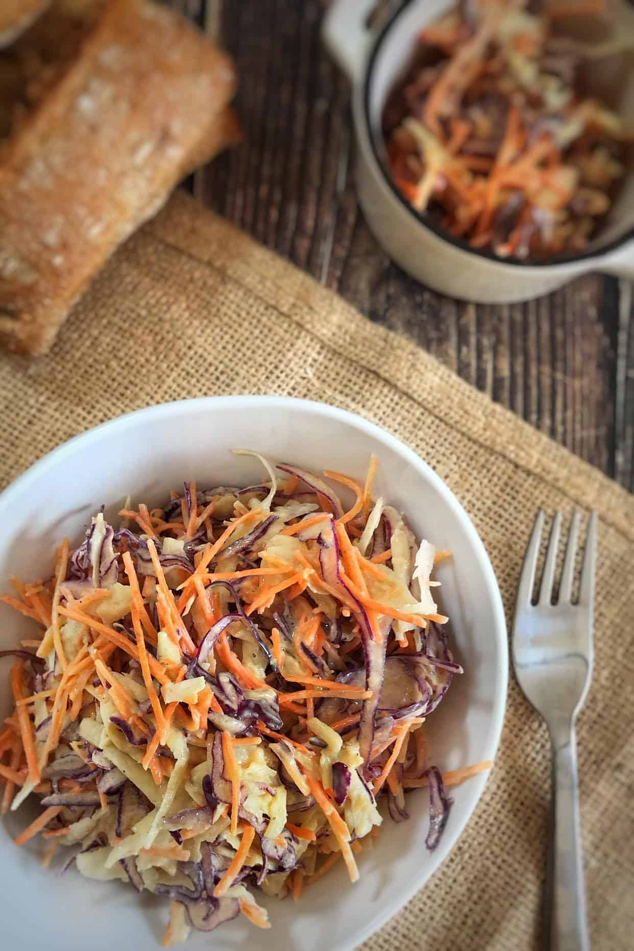 Bowl of creamy vegan coleslaw.