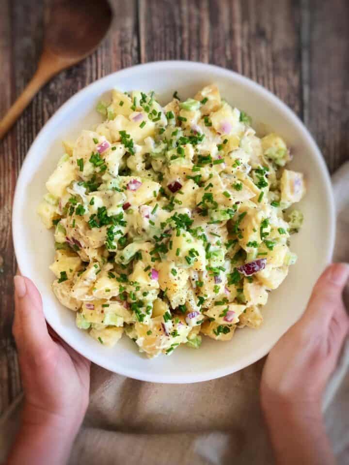 Bowl of creamy vegan potato salad.