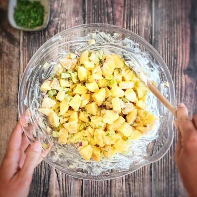 Vegan potato salad mixed in a bowl.