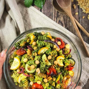 Vegan pesto pasta salad in a bowl.