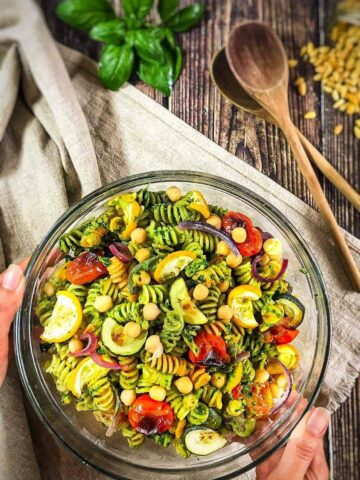 Vegan pesto pasta salad in a bowl.