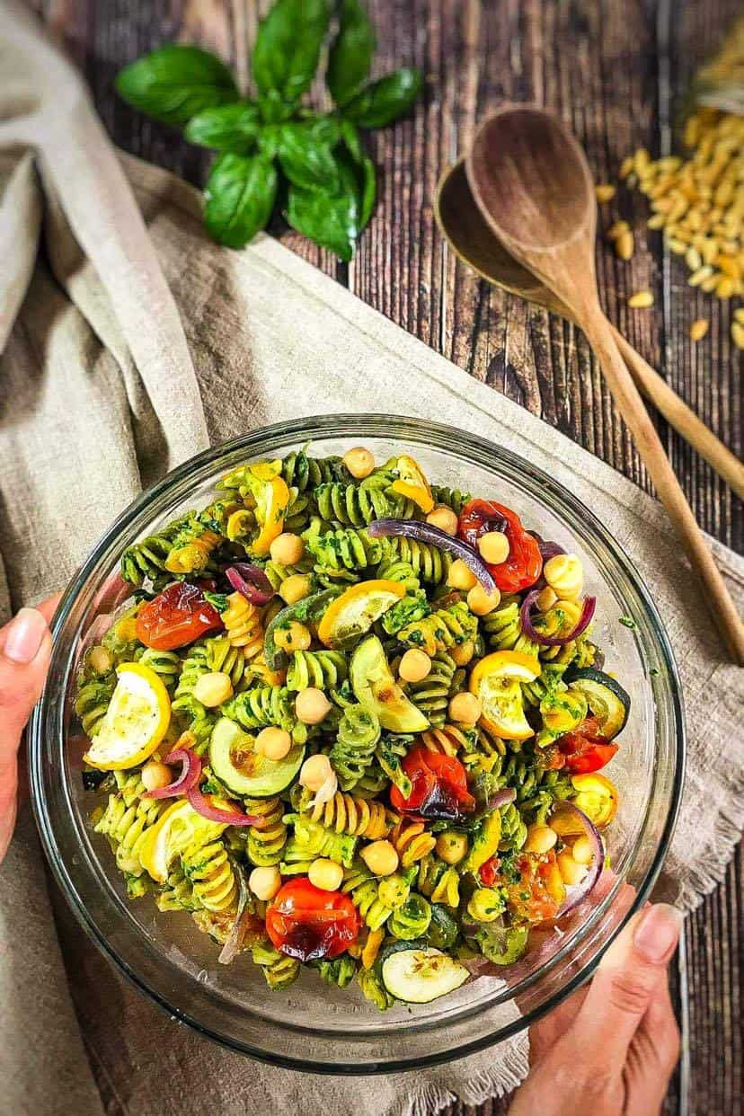 Vegan pesto pasta salad in a bowl.