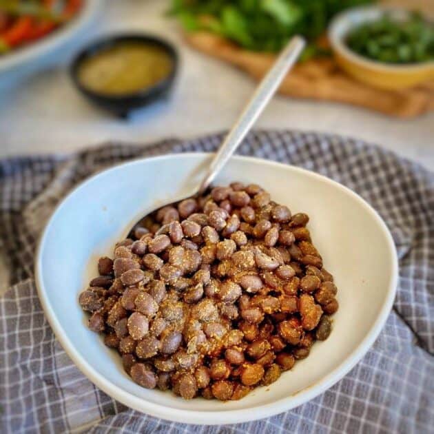 Cooked black beans in a bowl.