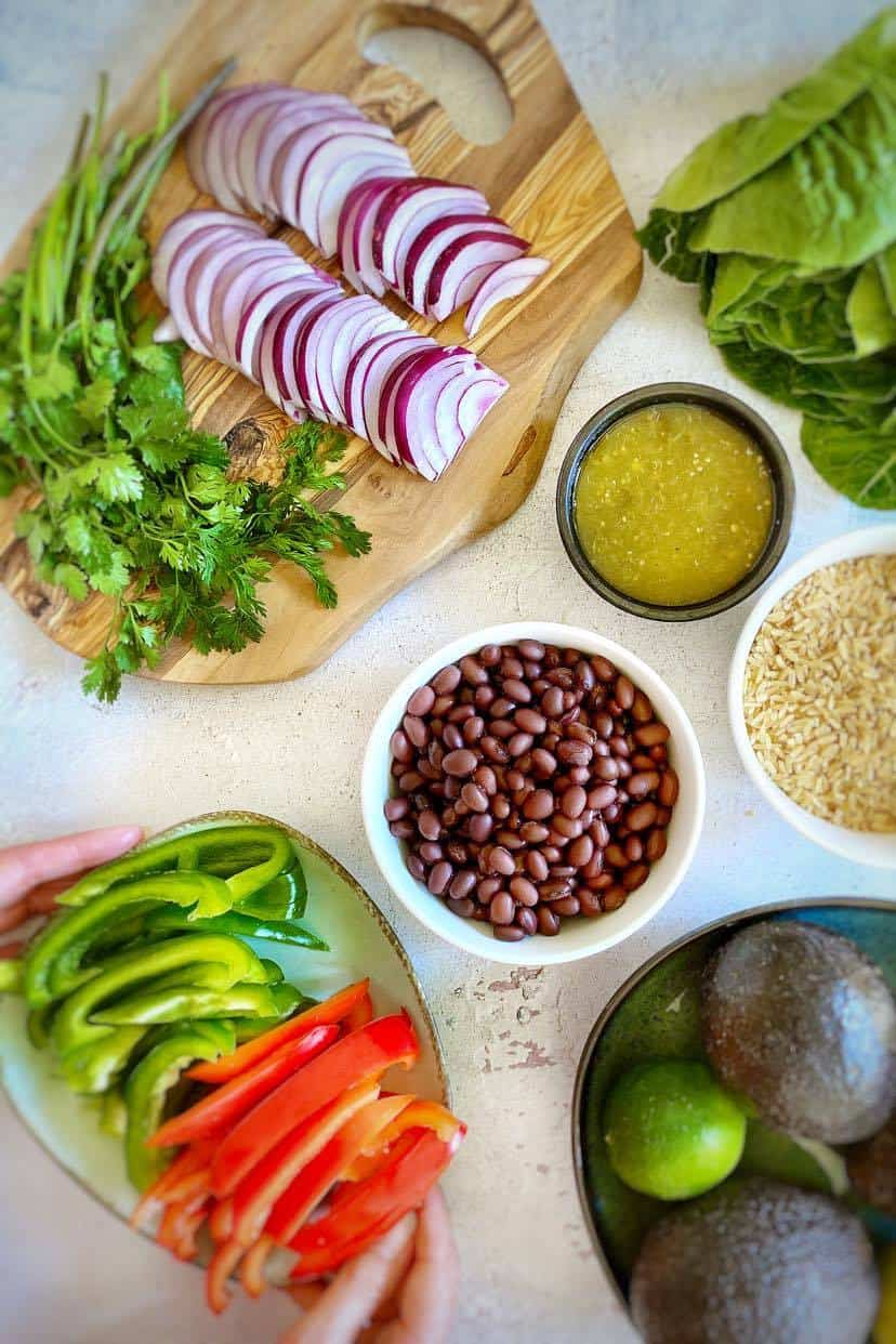 Raw ingredients for vegan burrito bowls.