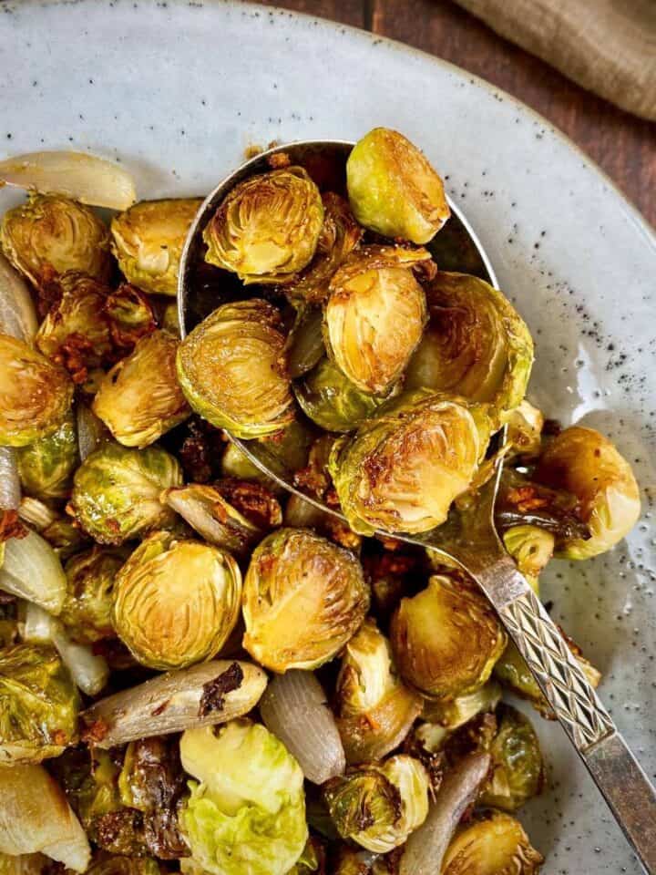 Maple balsamic roasted Brussels sprouts in a bowl.