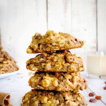 Stack of vegan oatmeal raisin cookies.