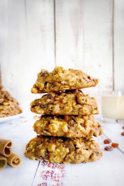 Vegan oatmeal raisin cookies stacked.