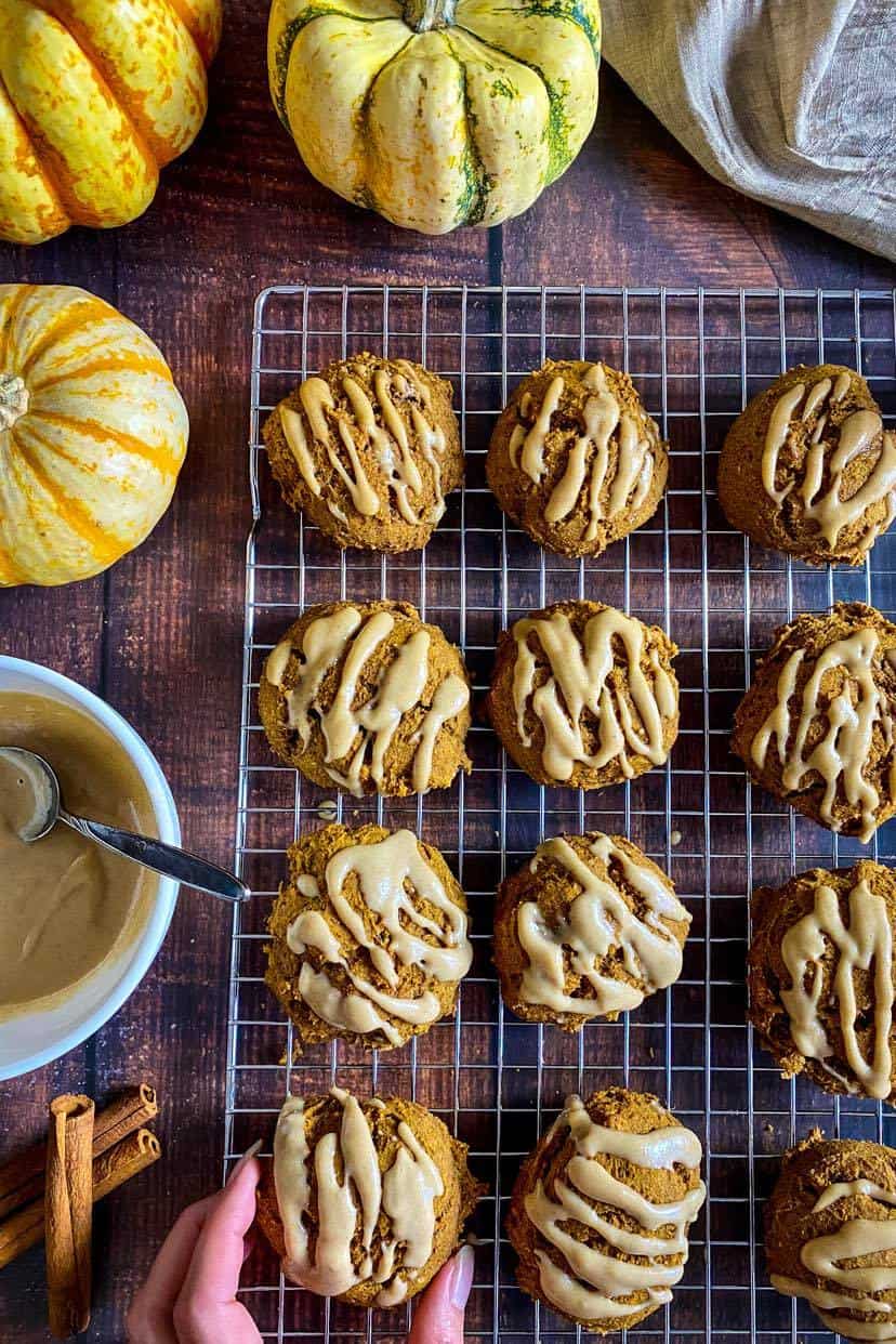 Vegan pumpkin cookies on a drying rack.