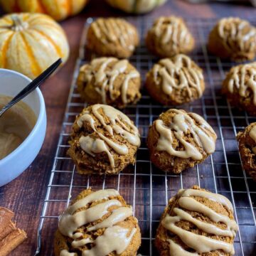 Vegan pumpkin cookies on a drying rack.