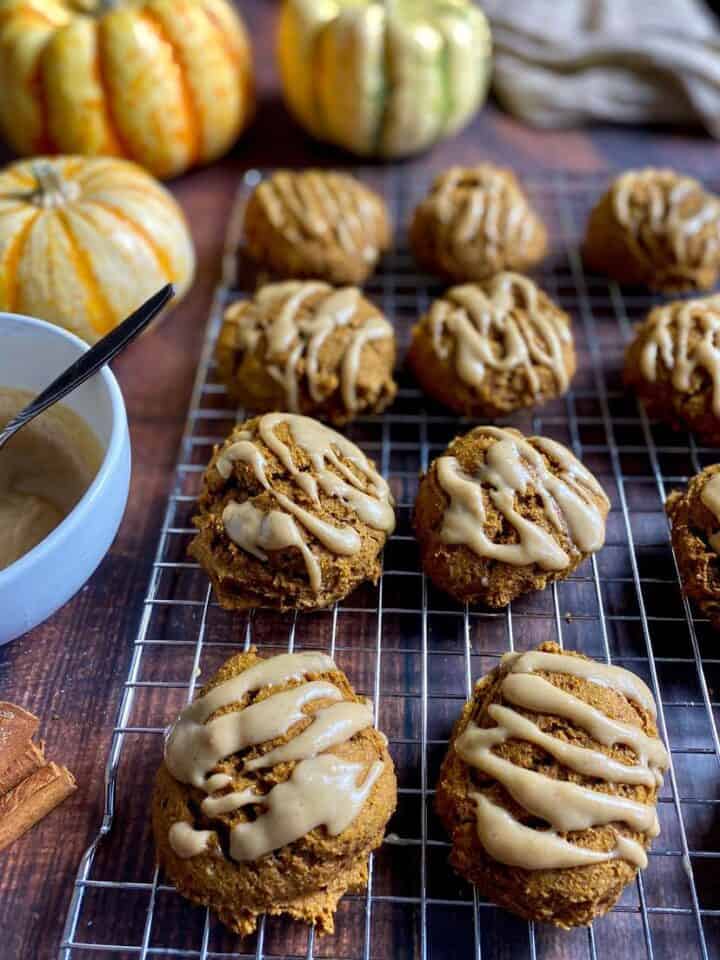 Vegan pumpkin cookies on a drying rack.