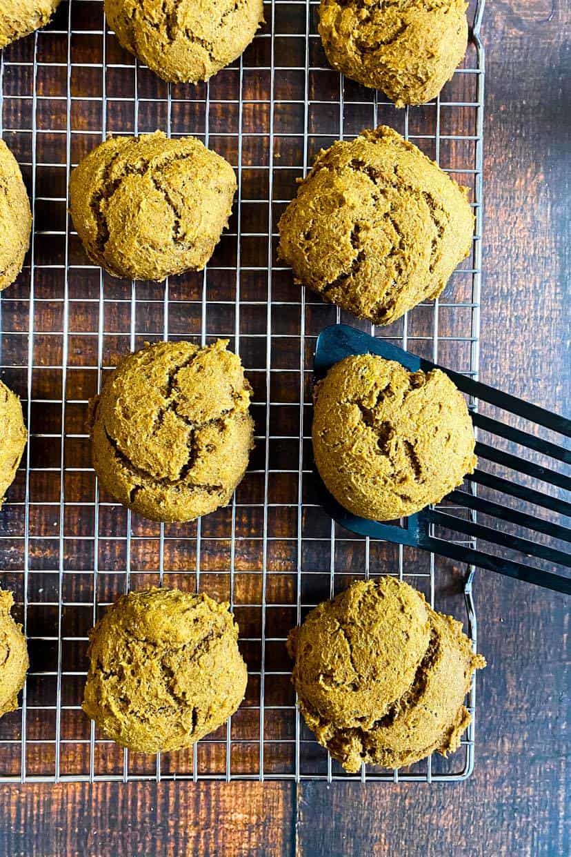 Vegan pumpkin cookies on a drying rack.