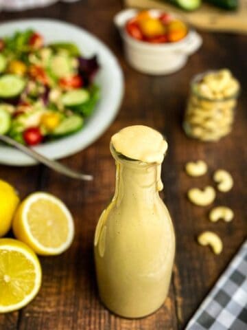 Vegan creamy balsamic dressing in a bottle.
