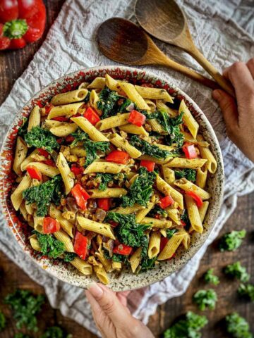 Vegan kale penne pasta in a bowl.