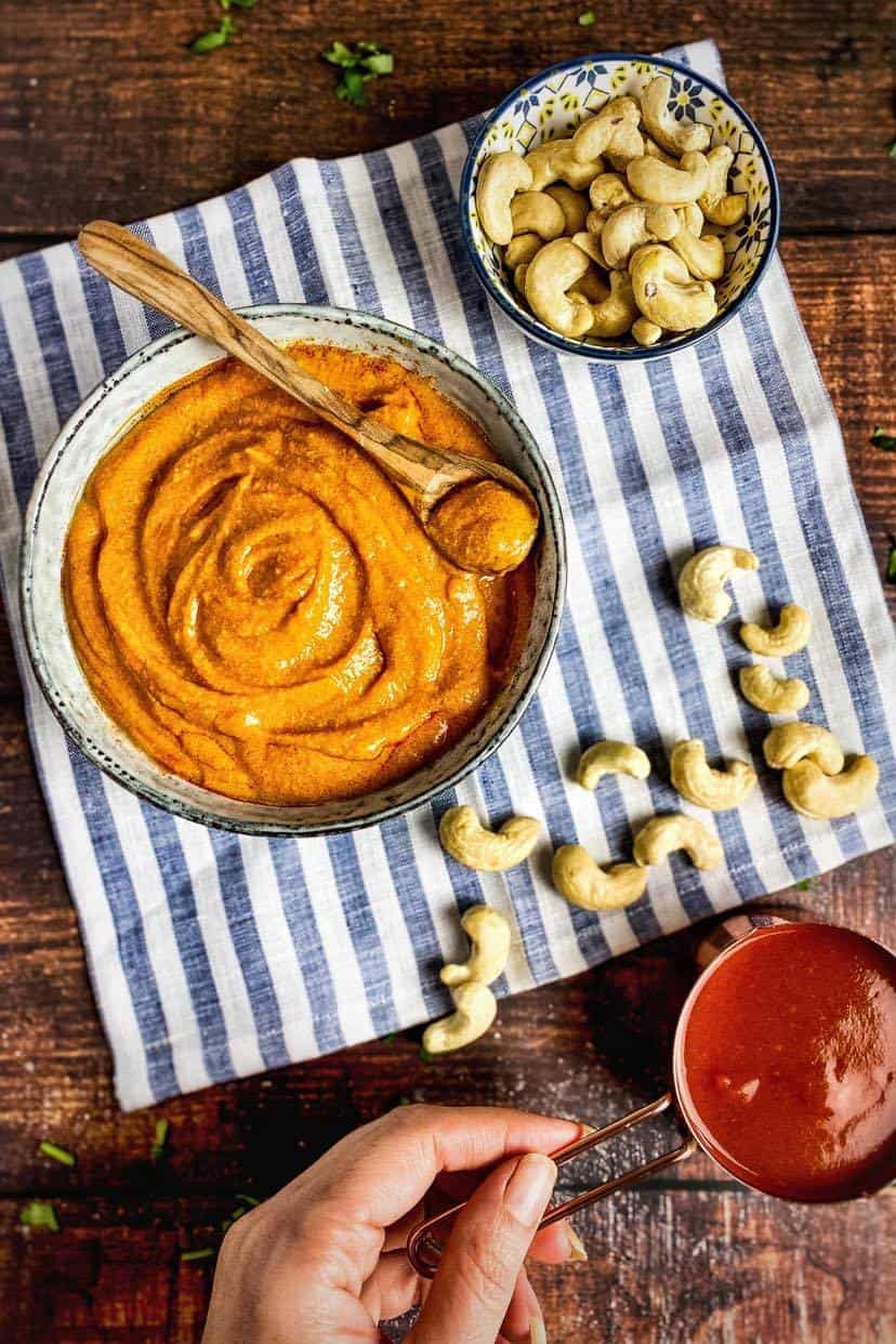 Vegan buffalo sauce in a bowl.