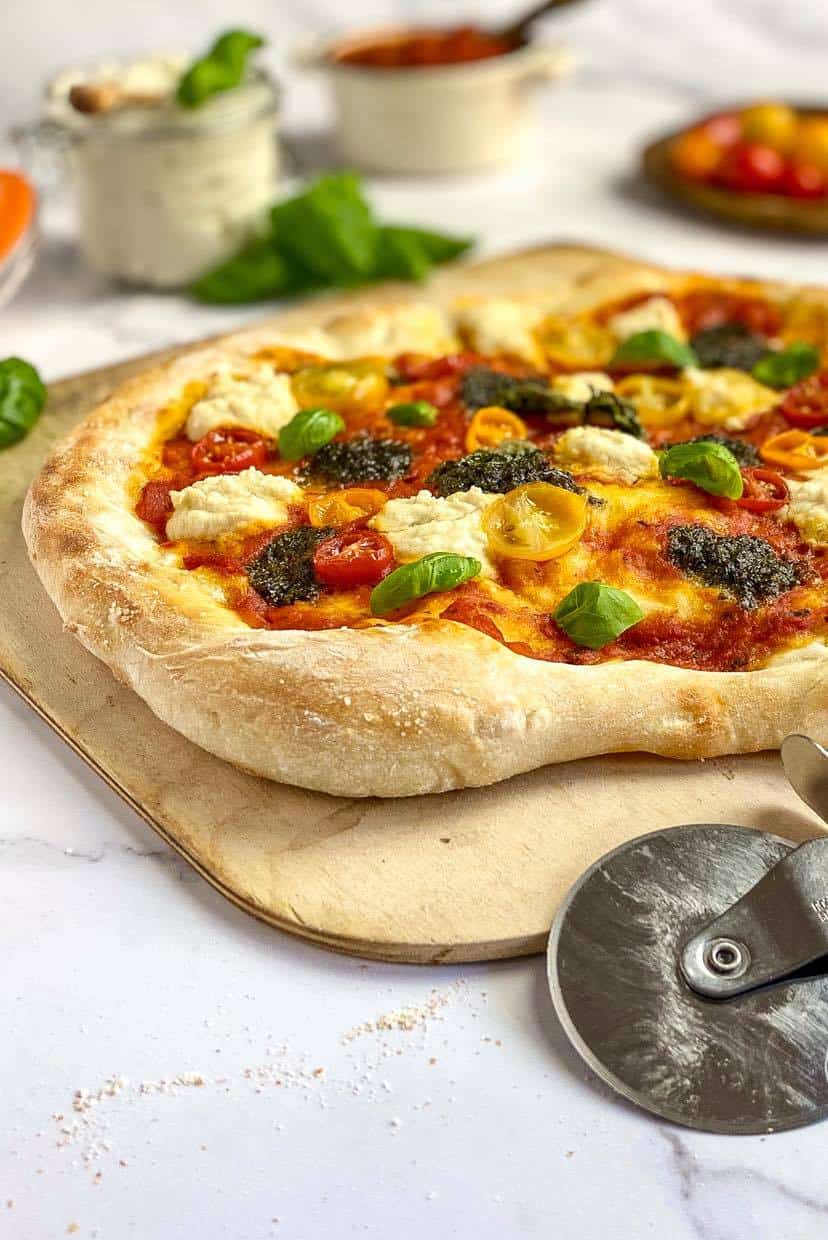 Closeup of vegan pesto pizza.