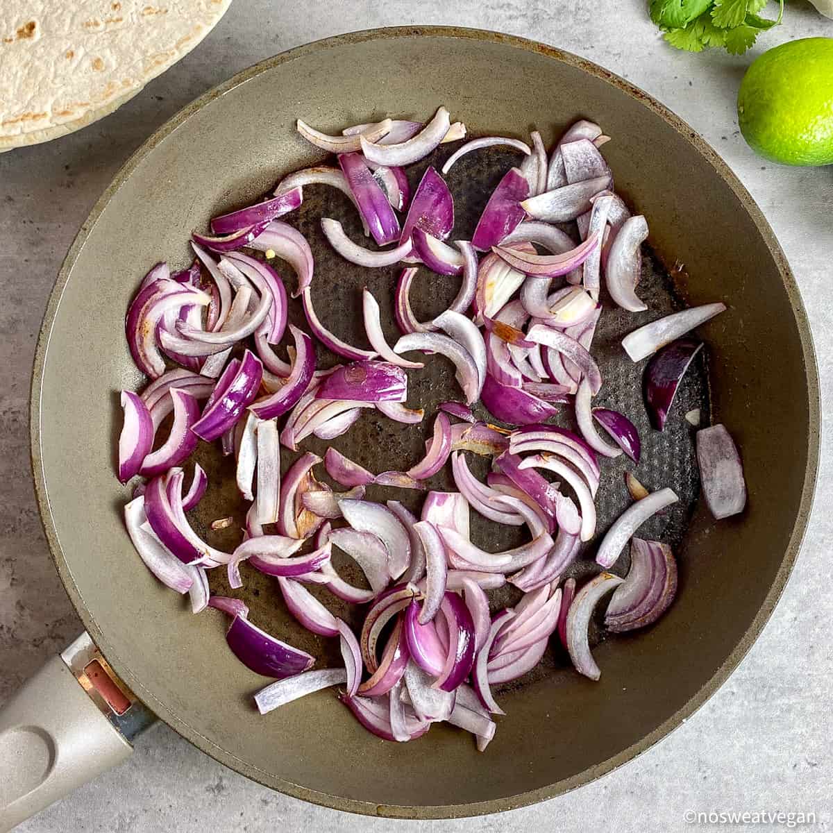 Onions in a skillet.