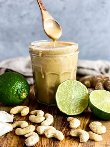 Closeup of Asian salad dressing in a jar.