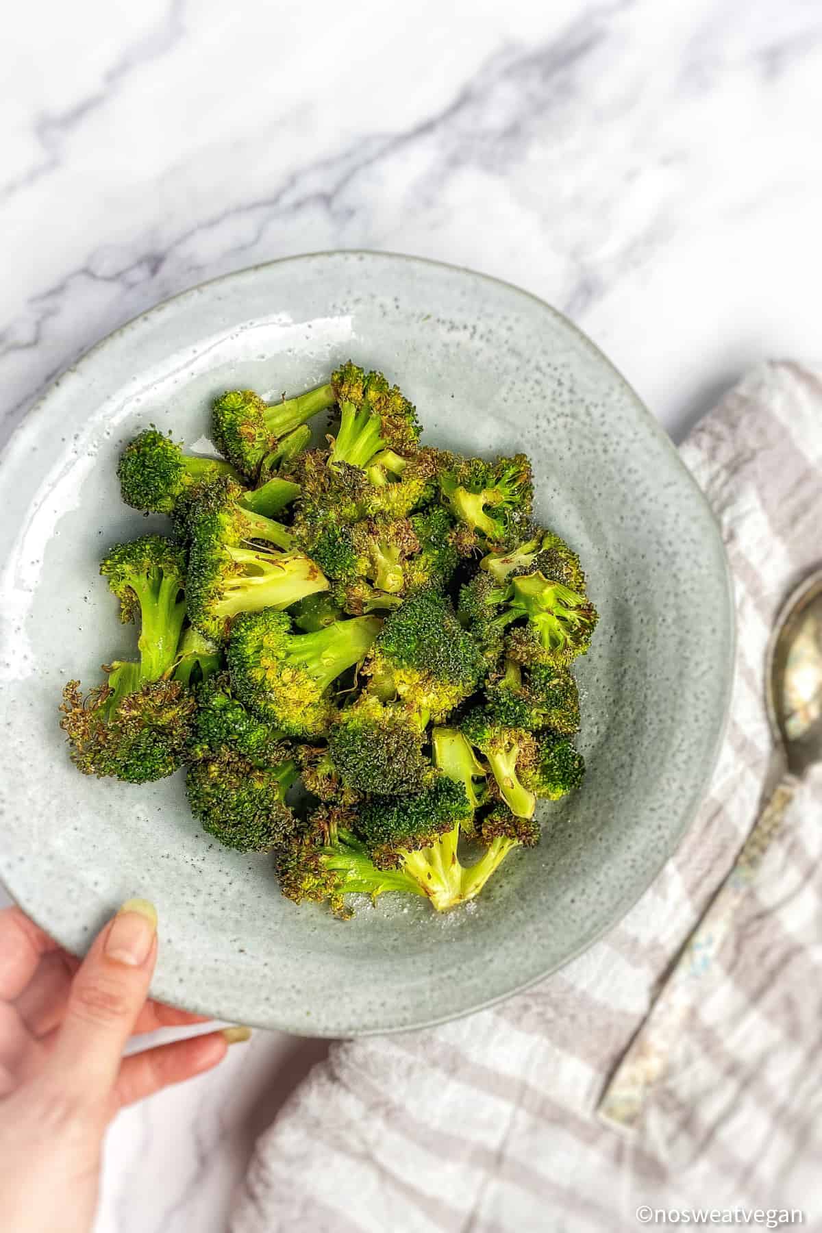 Air fryer broccoli in a bowl.