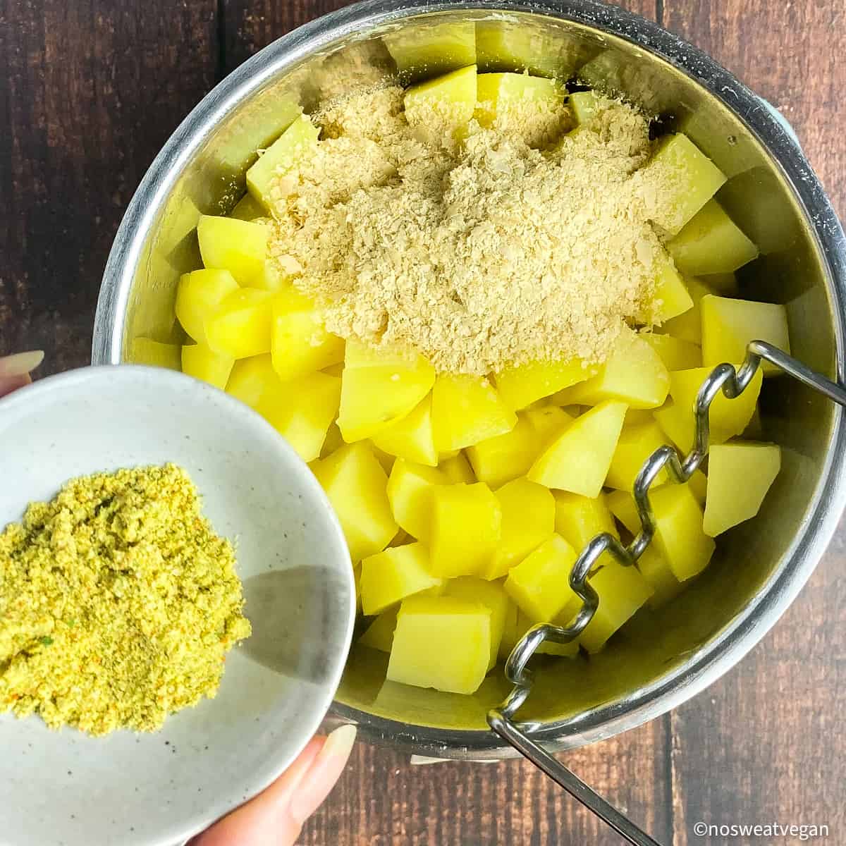 Cooked potatoes with nutritional yeast and seasonings.