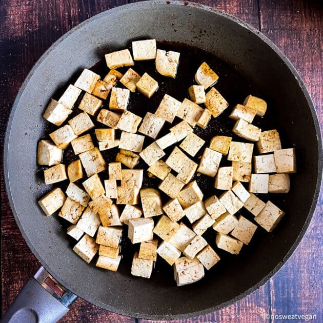 Tofu in a skillet.