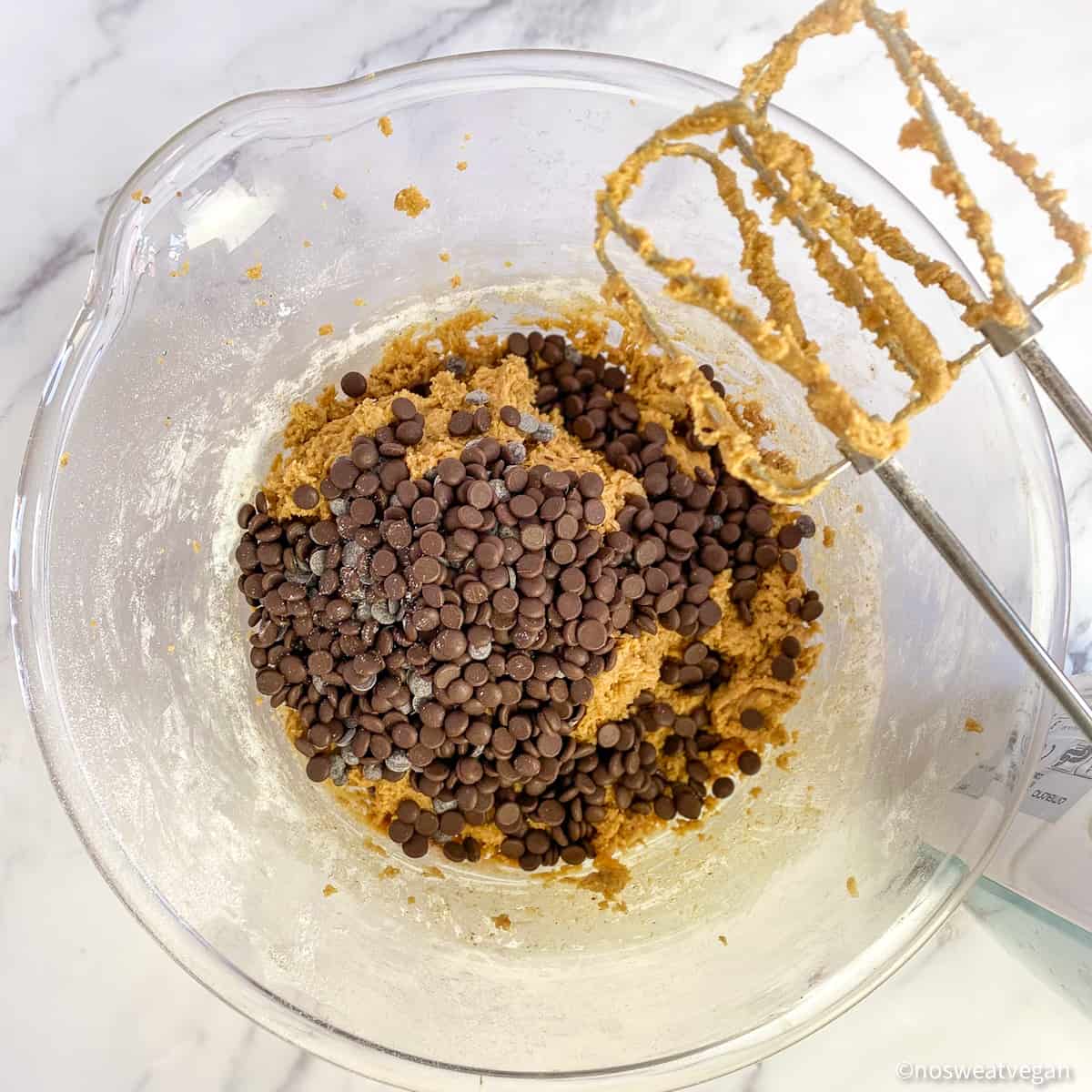 Mix the chips into the cookie dough.