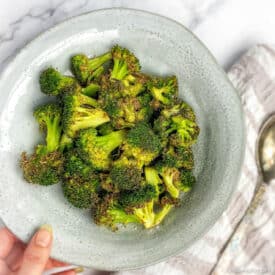 Air fryer broccoli in bowl.