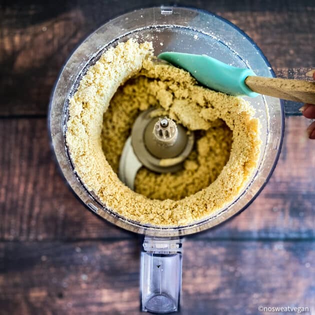 Scrape down the sides of the food processor.