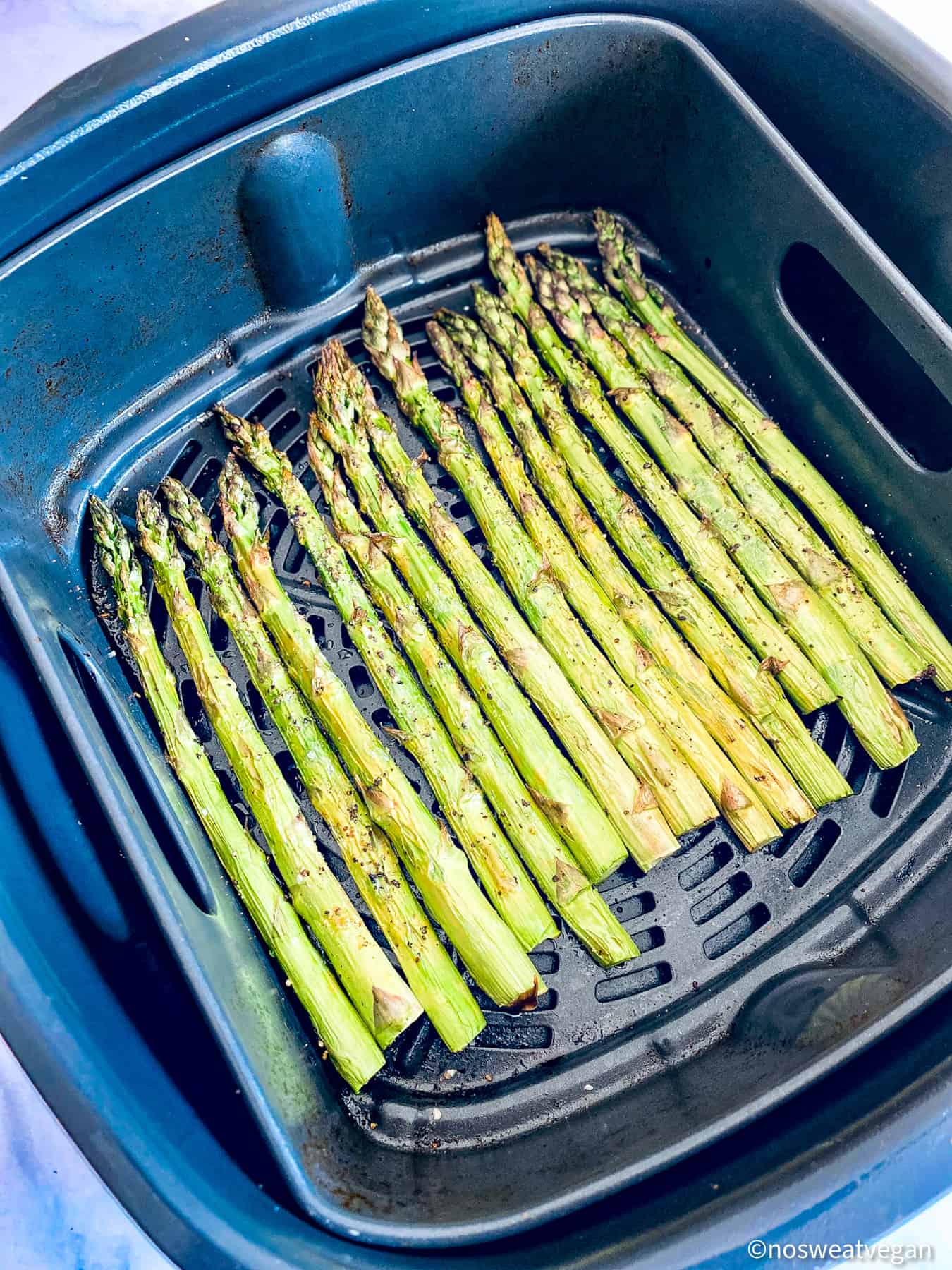 Crispy roasted asparagus in air fryer.