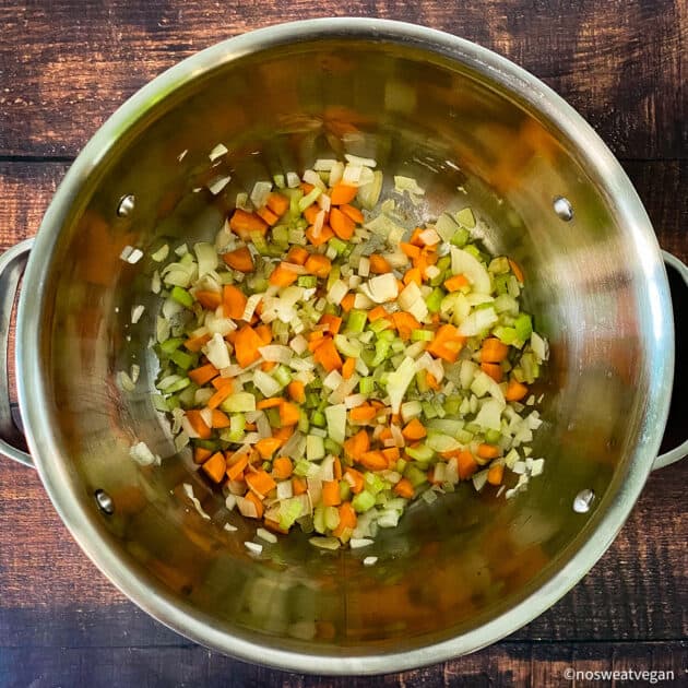 Cook the onions, celery, and carrots down.