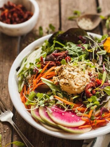 Hummus salad with greens.