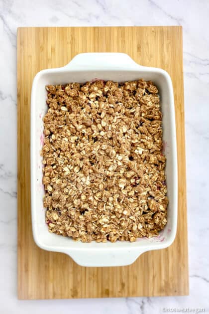 Mixed berry crumble in baking dish.