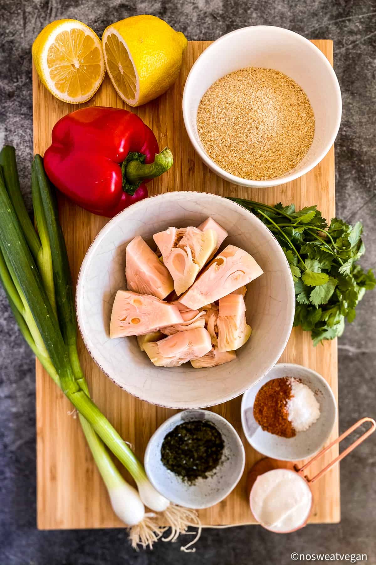 Vegan crab cake ingredients on cutting board.