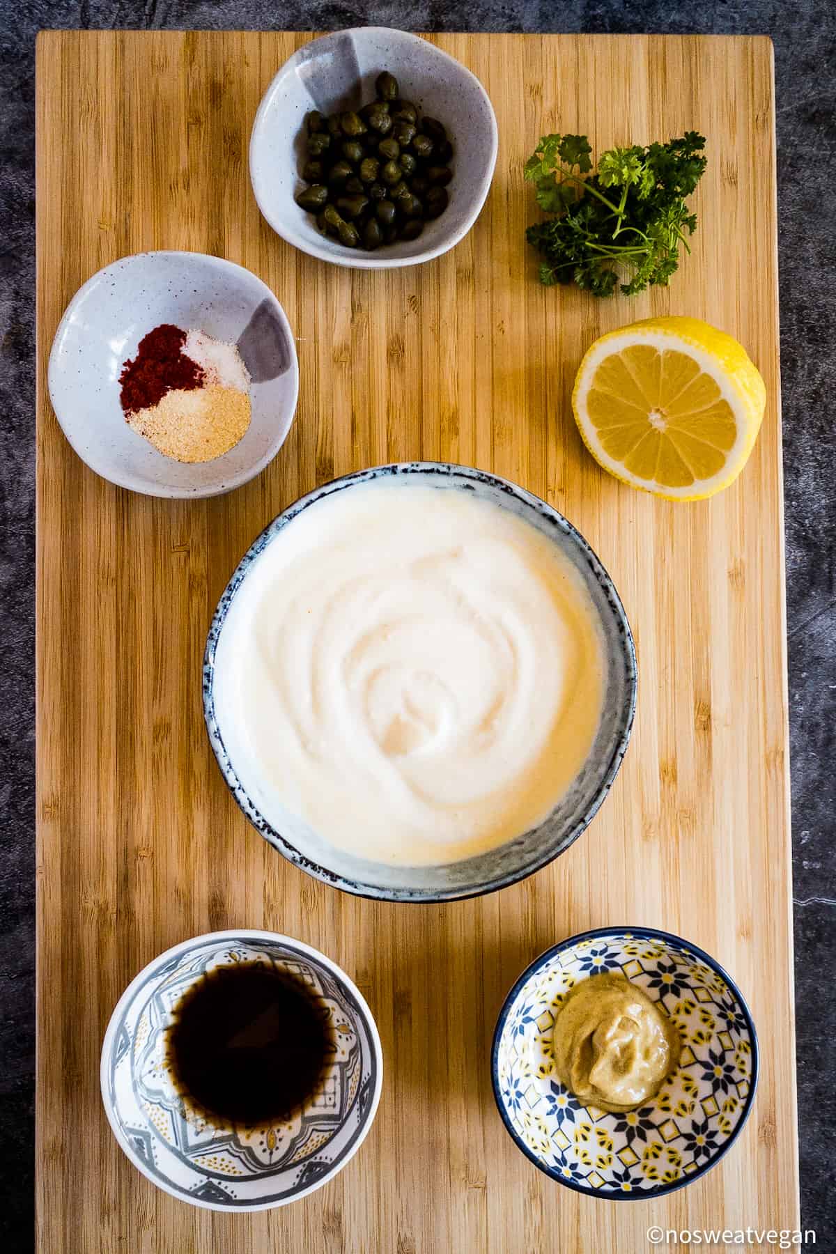 Ingredients for vegan remoulade: vegan mayo, Worcestershire sauce, mustard, lemon, parsley, capers, and spices.