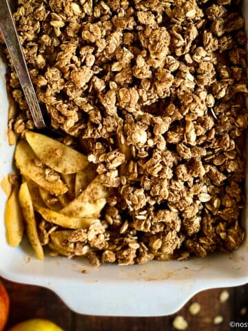 Vegan apple crisp in baking dish.