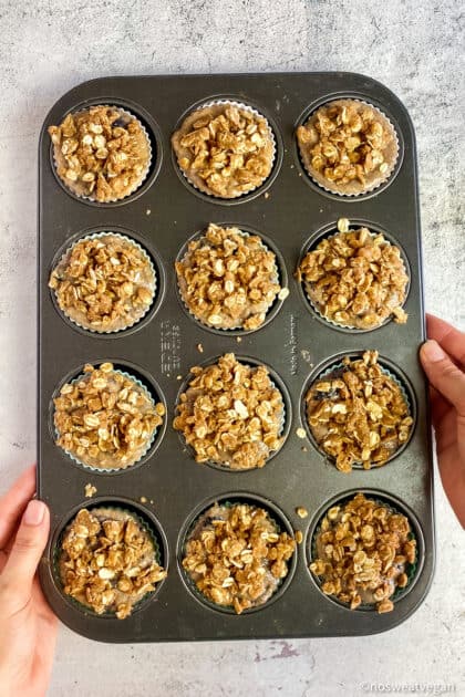 Blackberry muffins in pan ready to go in oven.