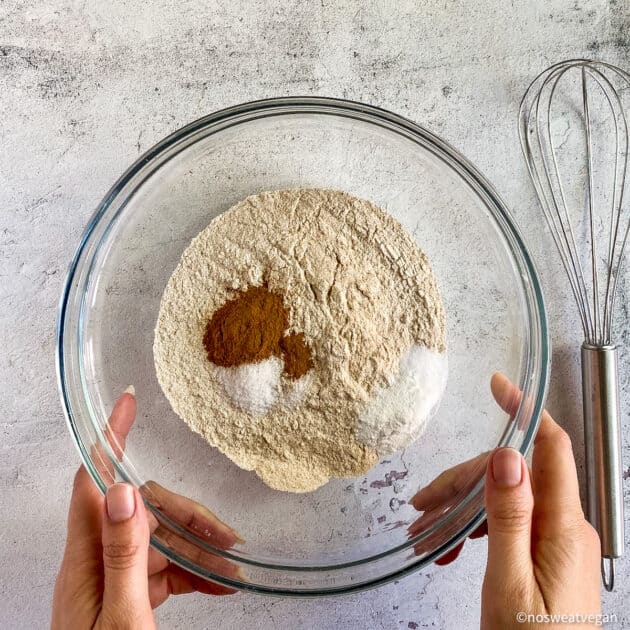 Whole wheat muffin dry ingredients in bowl.