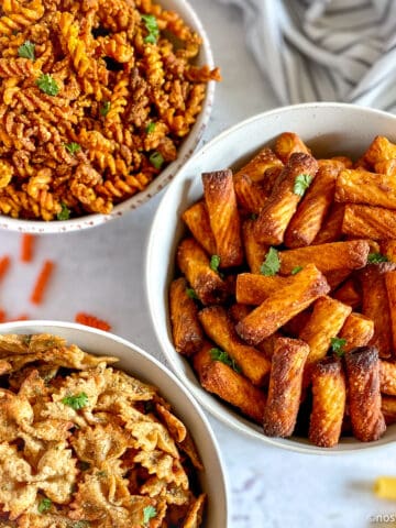 Three kinds of Air Fryer Pasta Chips in bowls.