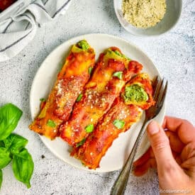 Best vegan cannelloni on plate with fork.