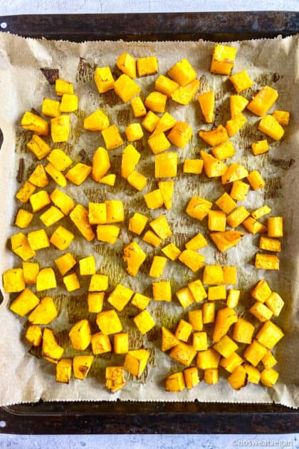 Roasted butternut squash on sheet pan.
