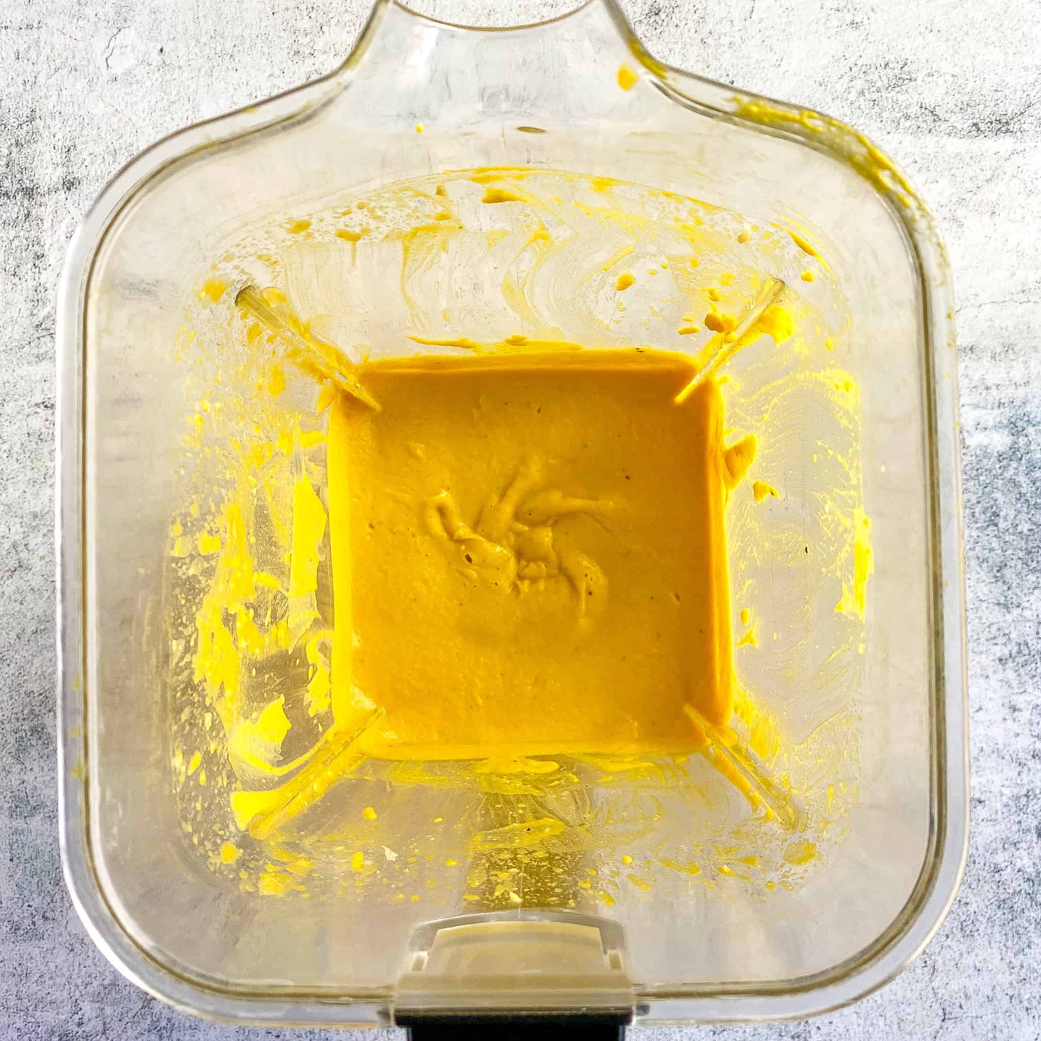 Vegan pumpkin mac and cheese sauce in blender.