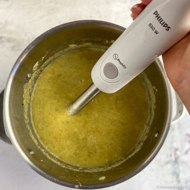 Blend broccoli soup with an immersion blender.